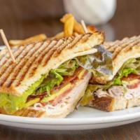Smoked Turkey Club · Peppered smoked turkey, maple bacon, pepper jack cheese, avocado, tomato, and lettuce grille...