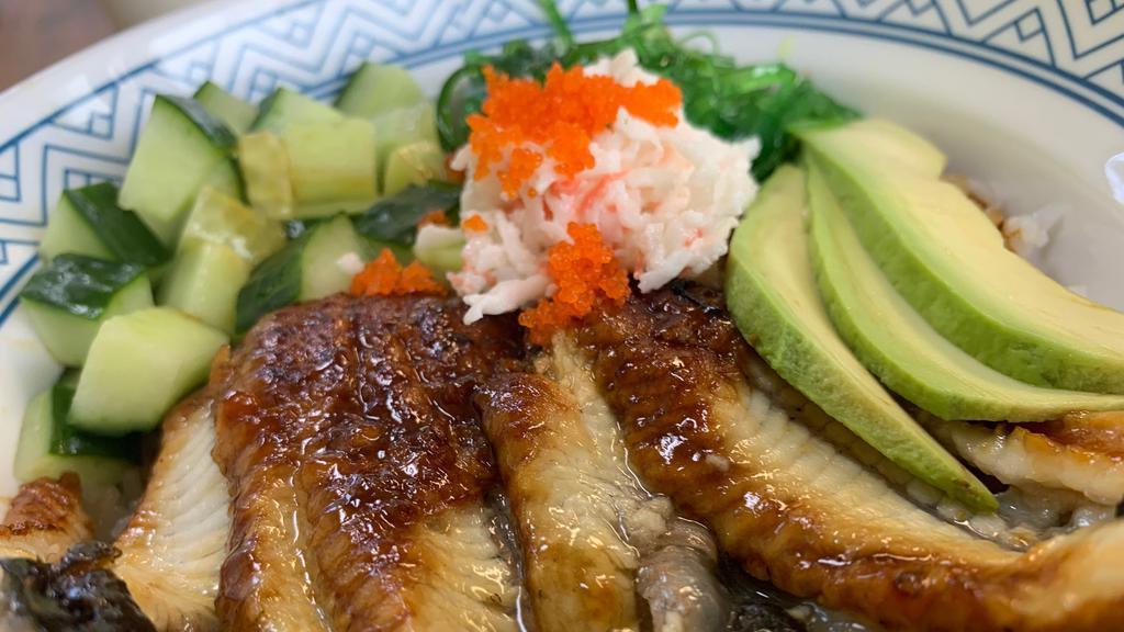 Unagi Donburi · 6pieces eel.cucumber.  mango.avocado.seaweed .crabmeat.eel sauce.spicy mayo and sesame. fish egg over rice