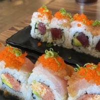 *Love Roll	 · Spicy tuna, crab, and avocado. Topped with albacore tuna and dressed with a masago, green on...