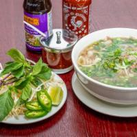 Noodle Soup With Round Eye Steak · Pho tai