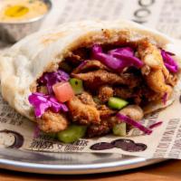 Chicken Kebob Wrap · Build your Pita or Wrap, filled with your choice of four Salads and Spreads