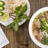 Beef Phở  · Rice noodles, medium rare strip loin, well-done beef flank, briskets, meatballs topped with ...
