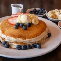 Buttermilk Pancakes · 3 fluffy buttermilk pancakes. Plain, simple and absolutely delicious. Served with maple syru...