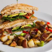 Turkey Sandwich · Our Frost turkey sandwich is filled with handcut, grilled turkey, cripsy bacon, avocado, spi...
