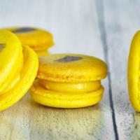 Limoncello French Macaron · The lemony representation of all things Spring and Summer. Take a bite of sunshine!
