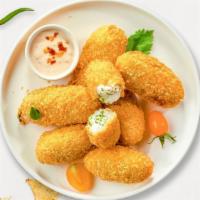 Jaja Jalapeño Poppers · Five delicious cream cheese stuffed jalapeno poppers, dipped in spicy breading, and fried un...