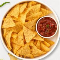 Chips & Salsa Love Story · Plain chips with pico de gallo salsa on the side.