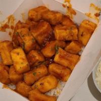 Tofu Box · Crispy tofu sautéd with your favorite sauce and steamed white rice.