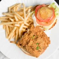 Fish Sandwich · Whiting fish on bread your choice of either coleslaw or lettuce, tomatoes & pickles. Served ...