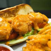 Shrimp Po Boy · Fried shrimp on a hoagie with lettuce, tomatoes, 1000 island dressing. Served with pickles a...