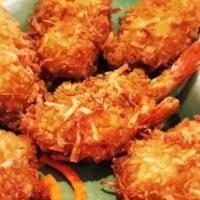 Coconut Shrimp (9 Pcs.) · Marinated shrimps deep fried with bread crumbs and fresh coconut. Served with sweet chili sa...