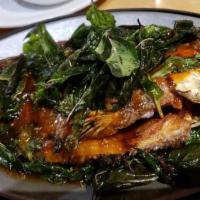 Sp12. Tilapia In Tamarind Sauce · Crispy whole tilapia topped with homemade tamarind, garlic, chili sauce, and basil. Served w...