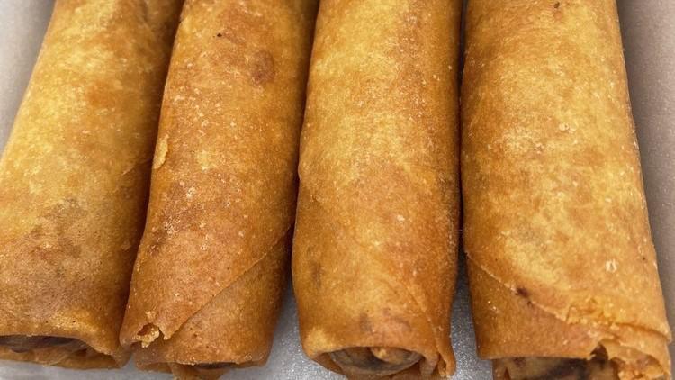 Egg Rolls (4 Pcs) · Carrots and cabbage stirred with soy sauce, salt, and pepper, wrapped in egg roll skins.