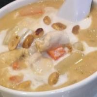 Massaman Curry · Chicken, beef, or pork in a peanut based curry with coconut milk, peanuts, potatoes, carrots...