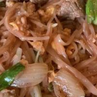 Pad Me Korat · Chicken, beef, or pork with rice noodles, eggs, bean sprouts, and green onions in a tangy re...