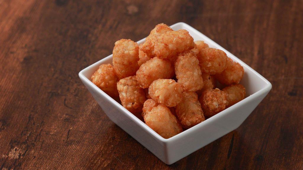 Tater Tots · A fan favorite, these classic tater tots are served golden-brown and crispy.