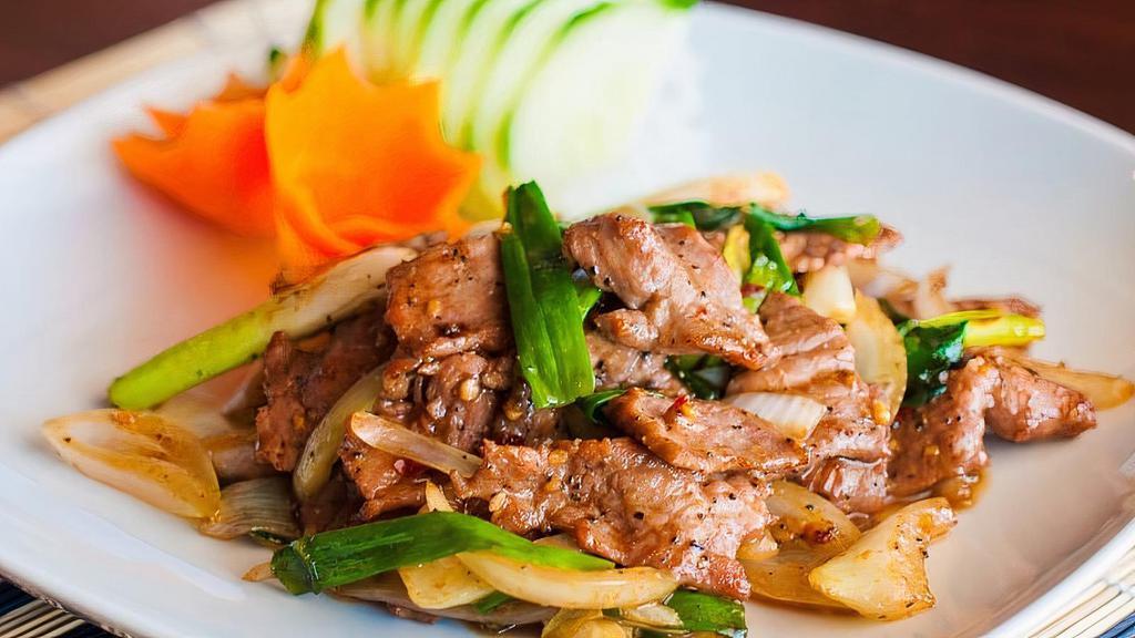 Mongolian Beef · Scallions and onions dry-cooked with black pepper and house spicy sauce.