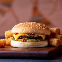 Classic Burger · 1/4lb. beef patty. mustard, ketchup, pickles, American cheese on a toasted sesame bun