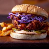 Hot Honey Chicken · Fried chicken thigh, Mama Lil's mayo, red cabbage slaw, pickles, hot honey drizzle all on a ...