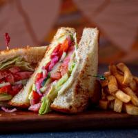 Veggie Sandwich · Texas toast, pepper jack, avocado, cucumbers, roasted red peppers, tomatoes, pickled red oni...