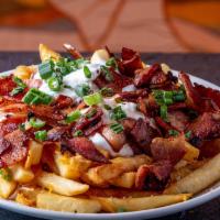 Loaded Fries Or Tots · Two options - please select below <br /><br />Cheese, bacon, green onions, sour cream on top...