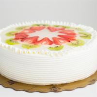 Fruit Cake · Light chiffon cake layered with fresh fruits (honey dew, cantaloupe and pineapple). With str...