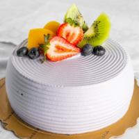 Taro Cake · Vanilla sponge cake layered with fresh taro puree and covered with vanilla whipped cream.