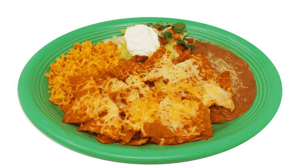 Chilaquiles · Fried corn tortillas served with red or green salsa and cheese on top. Served with rice, refried beans, lettuce, pico de gallo, and sour cream on the side. Your choice of homemade corn tortillas or flour tortillas. Add Two Eggs Extra for an additional charge. (choose egg preparation), Add your choice of asada or chicken for an additional charge.