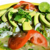 Camarones Ahogados · Shrimp only cooked in lime juice, purple onions, cilantro, avocado, cucumber and served with...