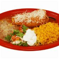 Chile Relleno · Fresh poblano pepper stuffed with a Monterey Jack cheese fried in an egg batter and smothere...