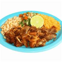 Carnitas Plate · Authentic Michoacan carnitas style braised pork served with rice, beans, pico de gallo, lett...