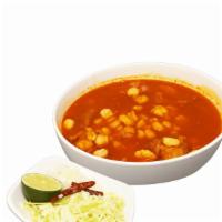 Pozole · Mexican traditional soup with white hominy, cabbage, onions, and lime on the side. Served wi...