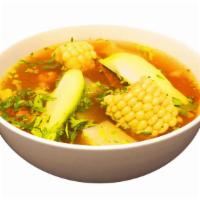 Caldo De Res · Beef stew served with carrots, chayote squash, zucchini, potatoes, and fresh corn. Served wi...