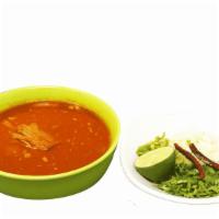 Birria Soup  · Shredded beef soup served with cilantro, onions, chopped serrano chile, lime on the side, an...