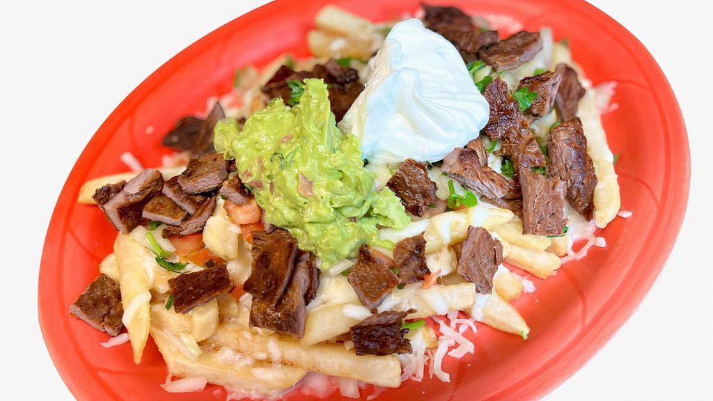 Asada Fries  · French fries served with steak, melted cheese,pico de gallo, guacamole and sour cream.