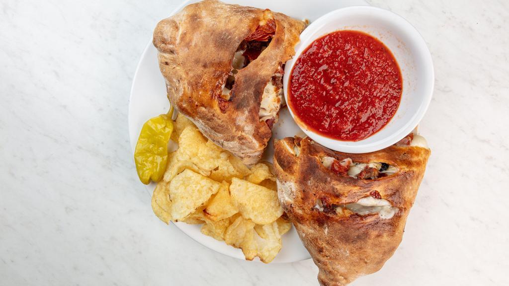 All Meat Calzone · Pepperoni, sausage, ham, canadian bacon and meatballs .