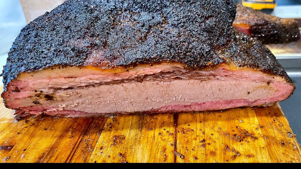Texas Style Brisket 1/2 Lb. · Smoked low for a minimum of 14 hours! Mixture of lean and moist (fatty) meat. Check out our website for whole brisket orders!