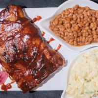 Half Rack Plate · A slab of meaty hardwood smoked ribs smothered in your favorite sauce. Served with your choi...