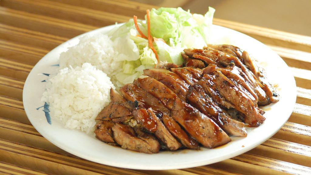 Chicken Teriyaki Plate · Our famous Chicken Teriyaki Plate with house made teriyaki sauce! Comes with side salad and rice.