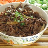 Bulgogi Bowl · Thinly sliced beef in Korean bulgogi marinade, stir fried with onions, topped with sesame se...