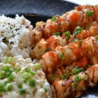 Firecracker Shrimp · Deep fried shrimp topped with tobiko aioli and unagi glaze.