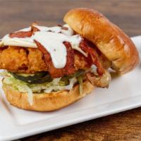 Fun Time Sally Sandwich · Crispy fried chicken breast topped with American cheese, bacon and ranch dressing, on a toas...