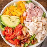 Chef Salad · Romaine lettuce topped with ham, turkey, bacon, american cheese, tomato, avocado and served ...