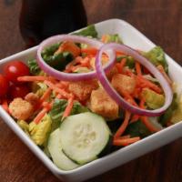 Side Kick Salad · Romaine, cucumber, shredded carrots, grape tomato, red onions and croutons.