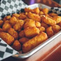 Cheese Curds · Cheese curds served with ranch dressing.