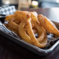 Onion Rings · Beer battered onion rings served with ranch or Cajun horseradish dipping sauce.