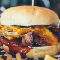 Jameson Burger · Jameson whiskey BBQ sauce, sauteed onions, cheddar cheese, and peppered bacon.