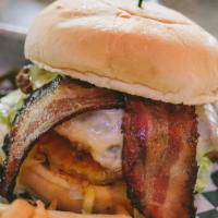Chopper Burger · Two slices of peppered bacon, mayonnaise, pickles, provolone cheese, tomatoes, and shredded ...
