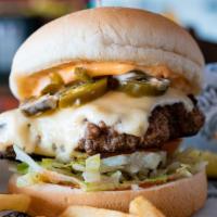 Southwest Burger · Sliced jalapenos, spicy mayo, Cajun seasoning, Sriracha, pepper jack cheese, lettuce, and to...