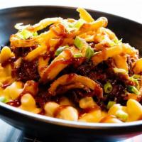 Bbq Pork Mac & Cheese · Slow-roasted pulled pork drizzled with Sickies’ savory BBQ sauce, topped with fried onion ta...